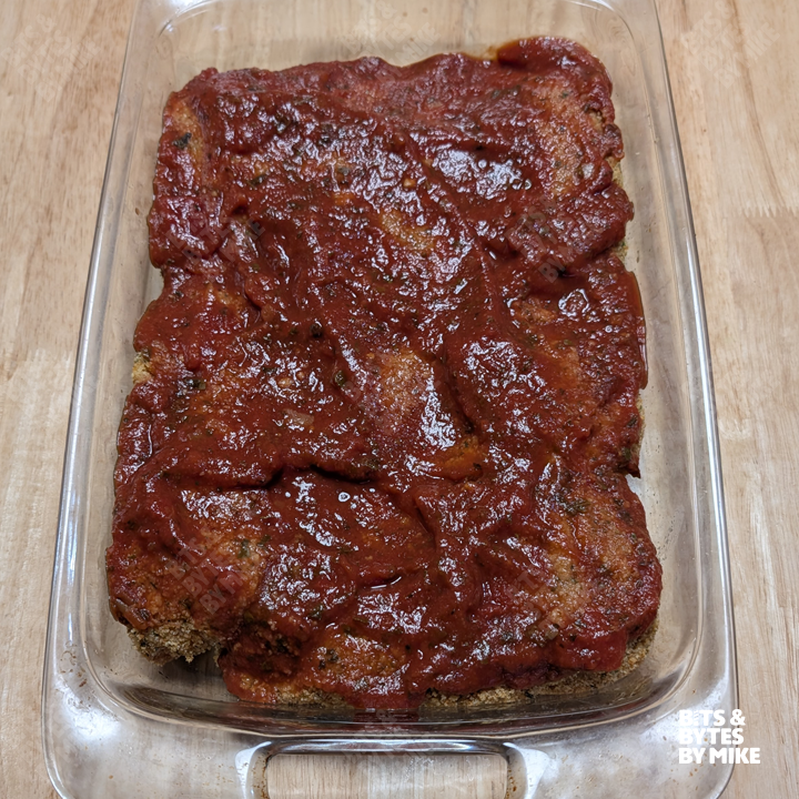 Photo of chicken covered in sauce